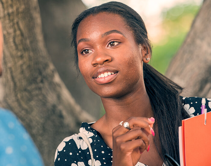 smiling female student 700x550